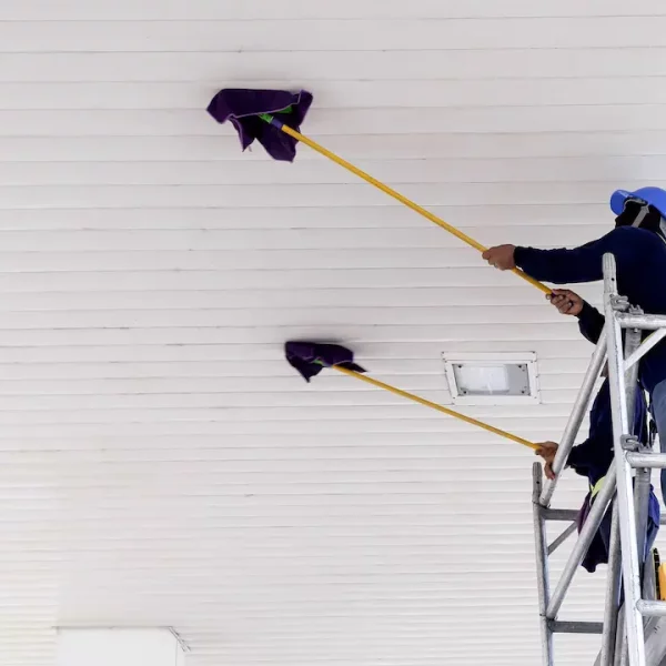 2-workers-on-scaffolding-using-flat-wet-mops-to-cl-2026-01-08-22-20-32-utc
