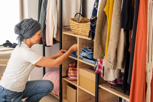 a-woman-is-sorting-things-out-in-her-wardrobe-an-2026-03-16-02-45-56-utc