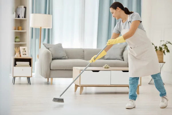 living-room-asian-housewife-and-sweeping-floor-fo-2026-01-09-09-24-24-utc