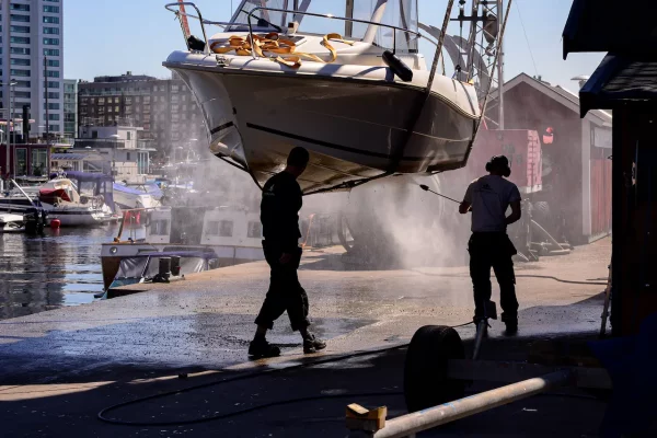 two-people-washing-a-boat-2026-03-18-16-12-14-utc